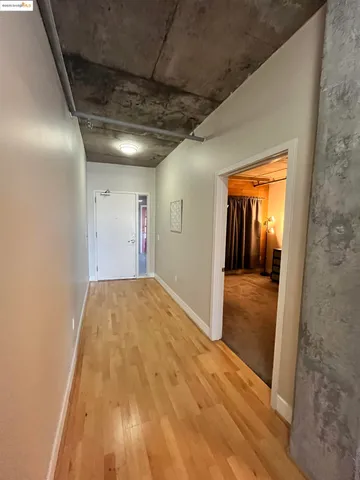 a view of gallery with red walls