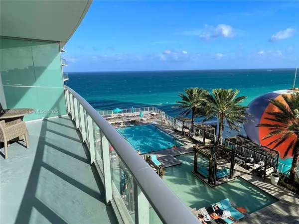a view of a balcony with an outdoor space