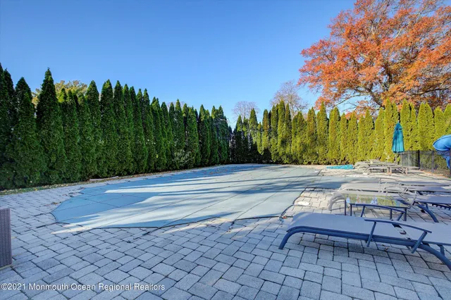 a garden view with a seating space