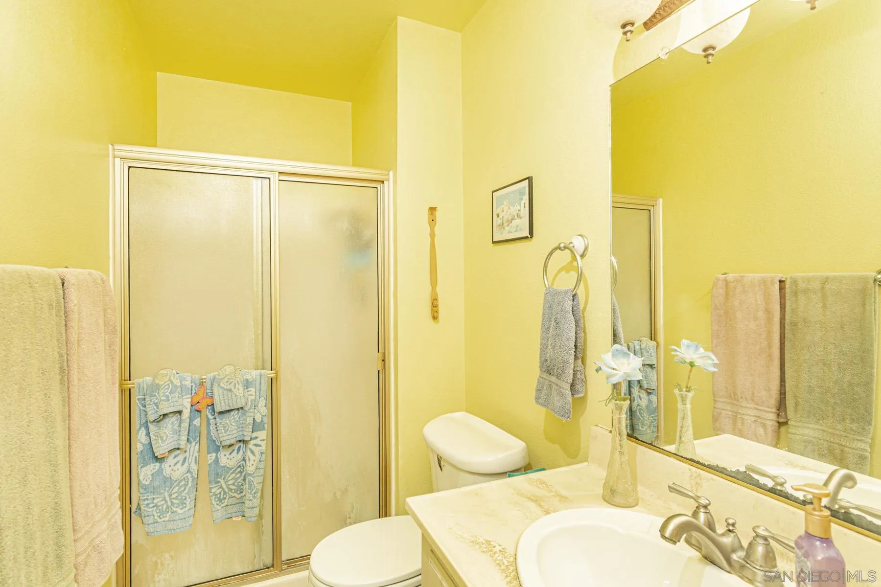 3433 Fairlomas Road National City, CA 91950 - Photo 12 of 43 a bathroom with a sink and a mirror