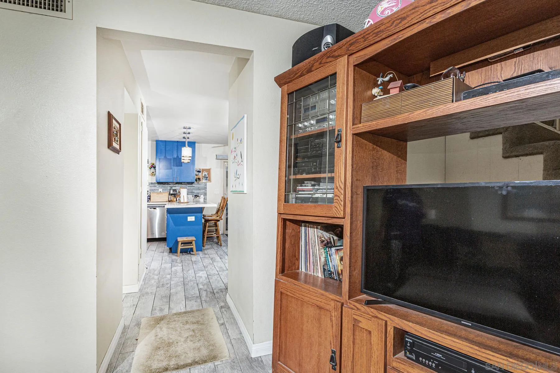 3433 Fairlomas Road National City, CA 91950 - Photo 17 of 43 a living room with furniture and a fireplace