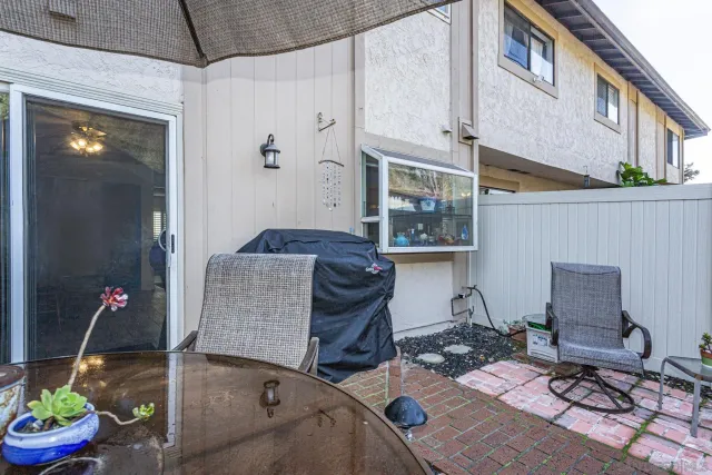 a backyard of a house with seating space