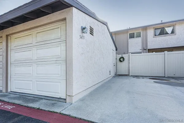 a view of a house with white door
