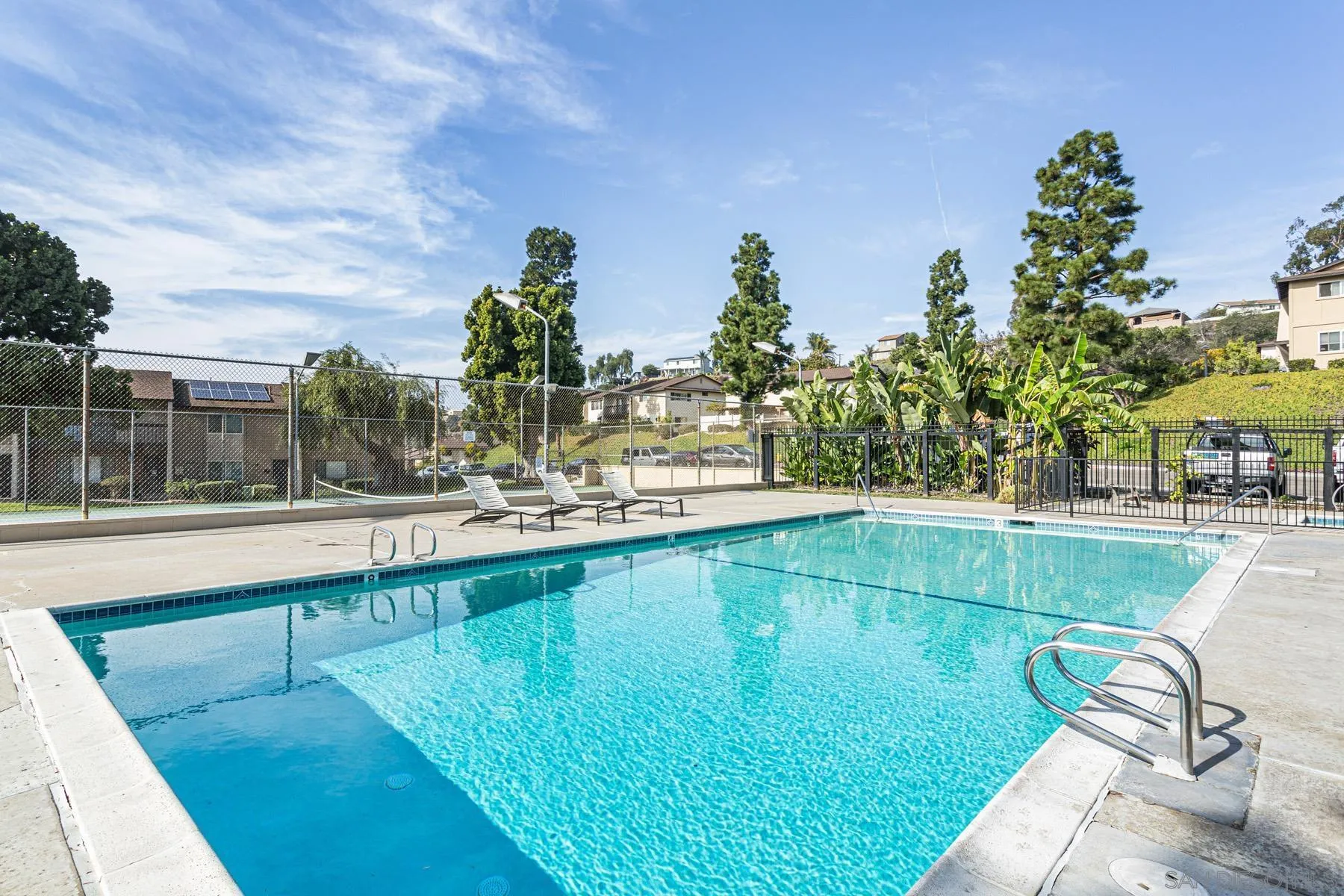 3433 Fairlomas Road National City, CA 91950 - Photo 27 of 43 a view of a swimming pool with a patio
