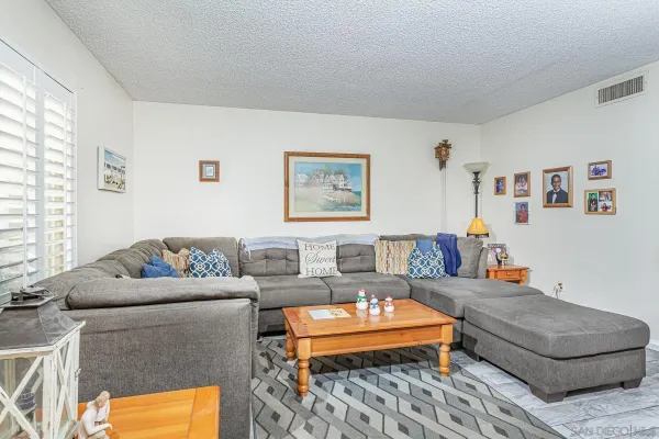 a living room with furniture and a couch