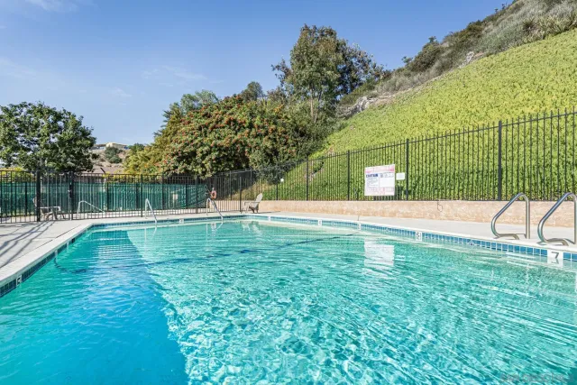 a view of a garden with a bench