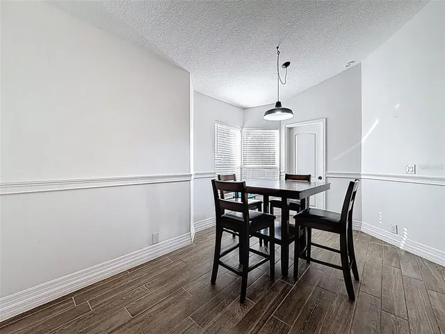 a view of a house with a big yard