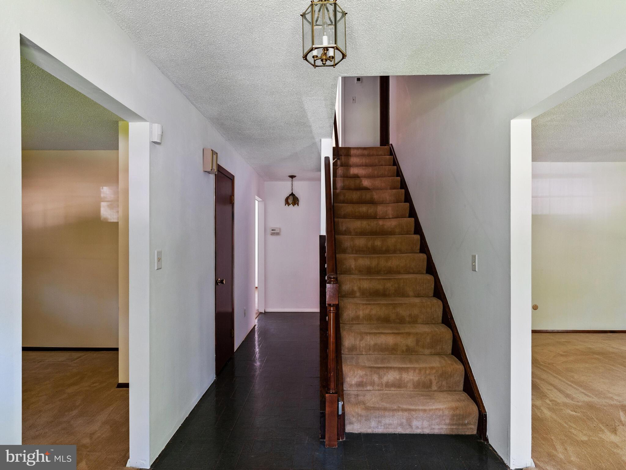 21 Forest Lane Ewing, NJ 08628 - Photo 15 of 23 Center staircase to second floor