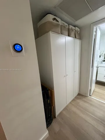 a view of a hardwood & cabinets