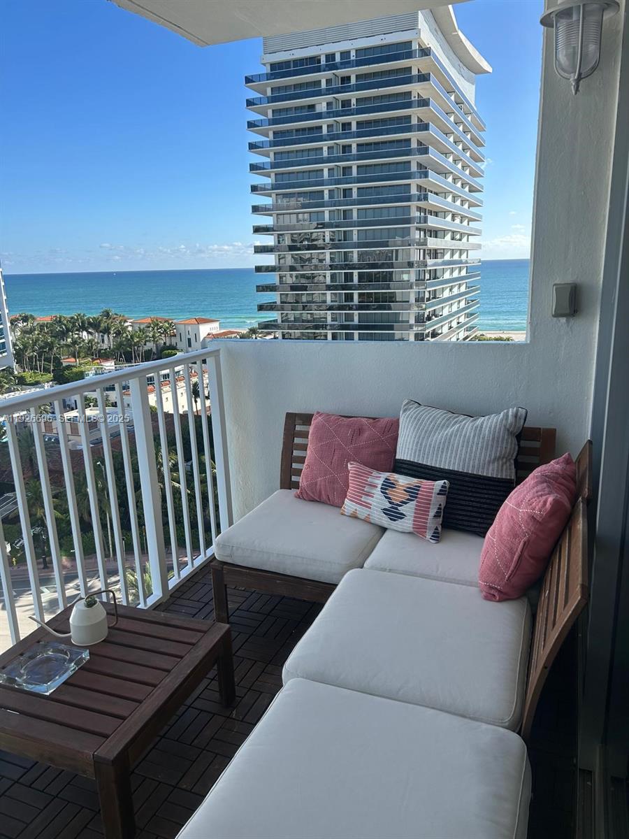 5838 Collins Avenue, Unit 11D Miami Beach, FL 33140 - Photo 10 of 24 a view of a balcony with two chairs