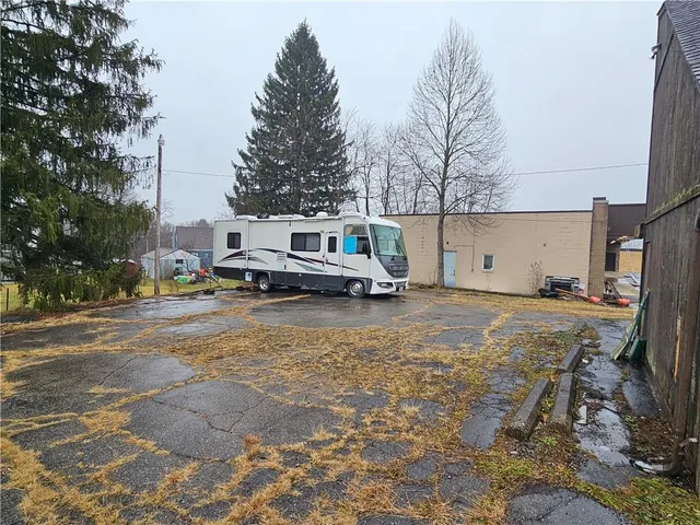a car parked in front of a house