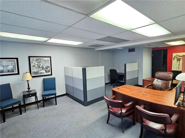 a view of a livingroom with furniture and a couch
