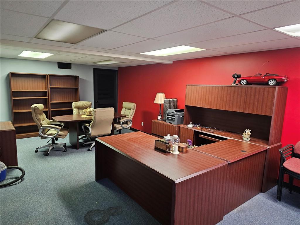 3083 Leechburg Road New Kensington, PA 15068 - Photo 9 of 17 a room with furniture a rug and a projector