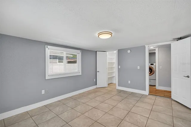 a view of an empty room with window