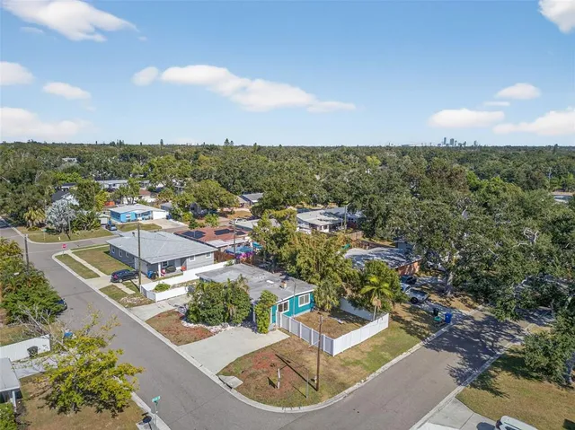 an aerial view of a house with a outdoor space