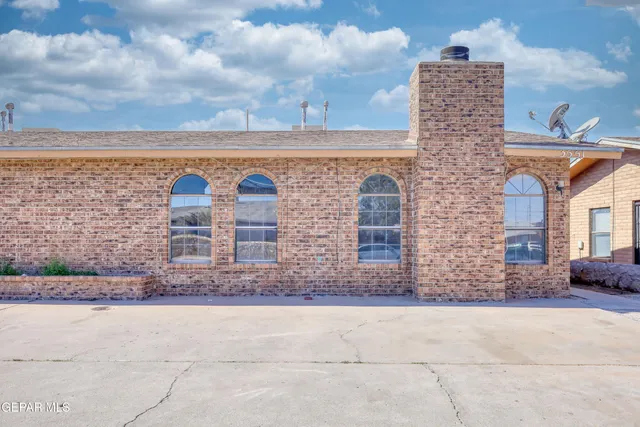 a brick building with a sink