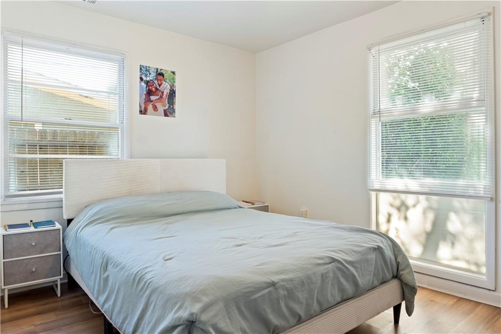 381 Lincoln Street Southwest Atlanta, GA 30315 - Photo 11 of 20 a large bed sitting in a bedroom next to a window