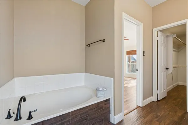 a bathroom with a bathtub