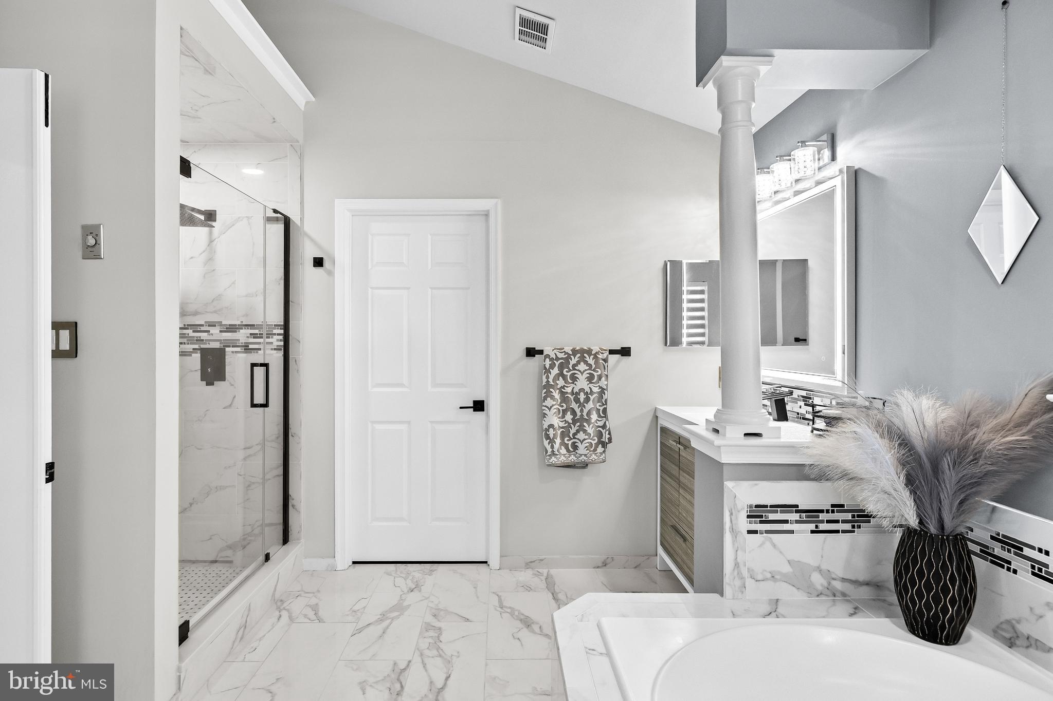 2 Rothbury Drive Lumberton, NJ 08048 - Photo 28 of 54 a en suite bathroom with a double vanity sink a large mirror and a shower