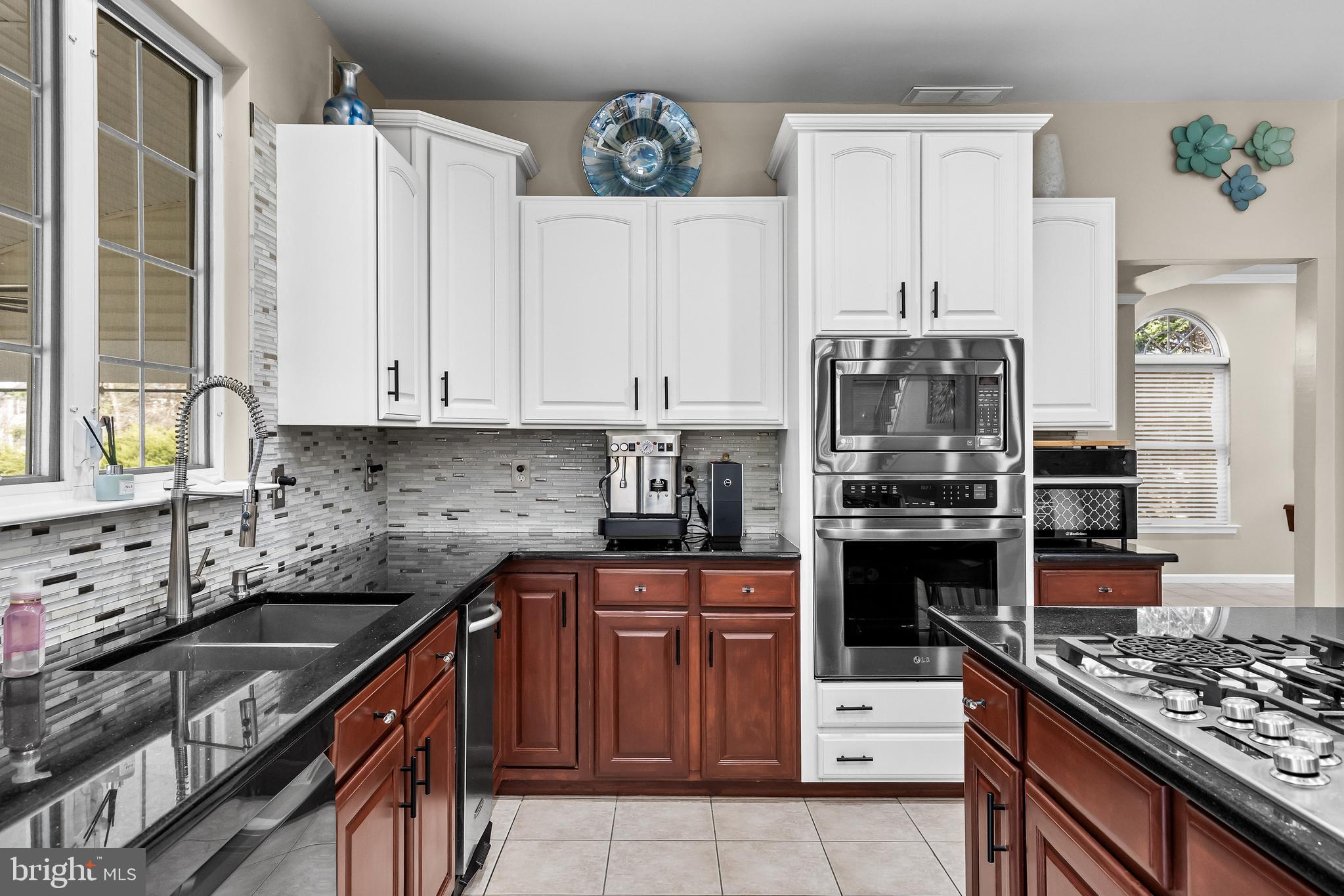 2 Rothbury Drive Lumberton, NJ 08048 - Photo 7 of 54 a kitchen with stainless steel appliances a stove sink and cabinets