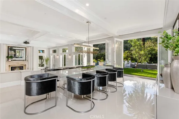 a kitchen with stainless steel appliances kitchen island a large island in the center