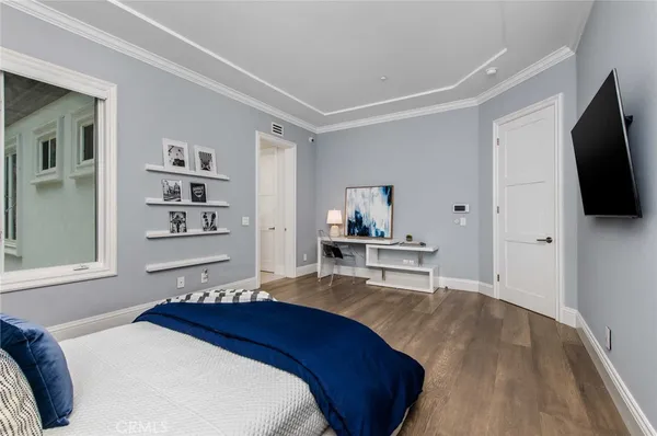 a kitchen with stainless steel appliances a sink and cabinets