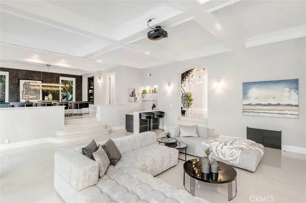 a kitchen with a sink and a stove next to a window