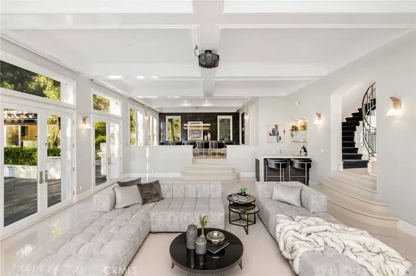 a kitchen with a sink and stove