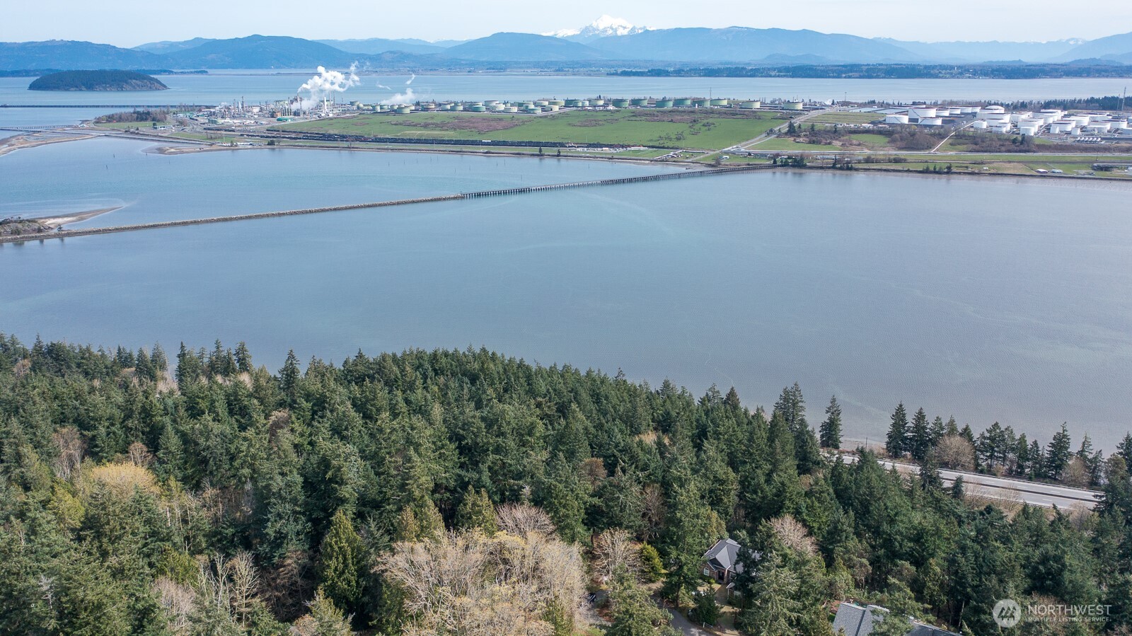 11711 Hummingbird Lane Anacortes, WA 98221 - Photo 5 of 14 an aerial view of a city and mountain view