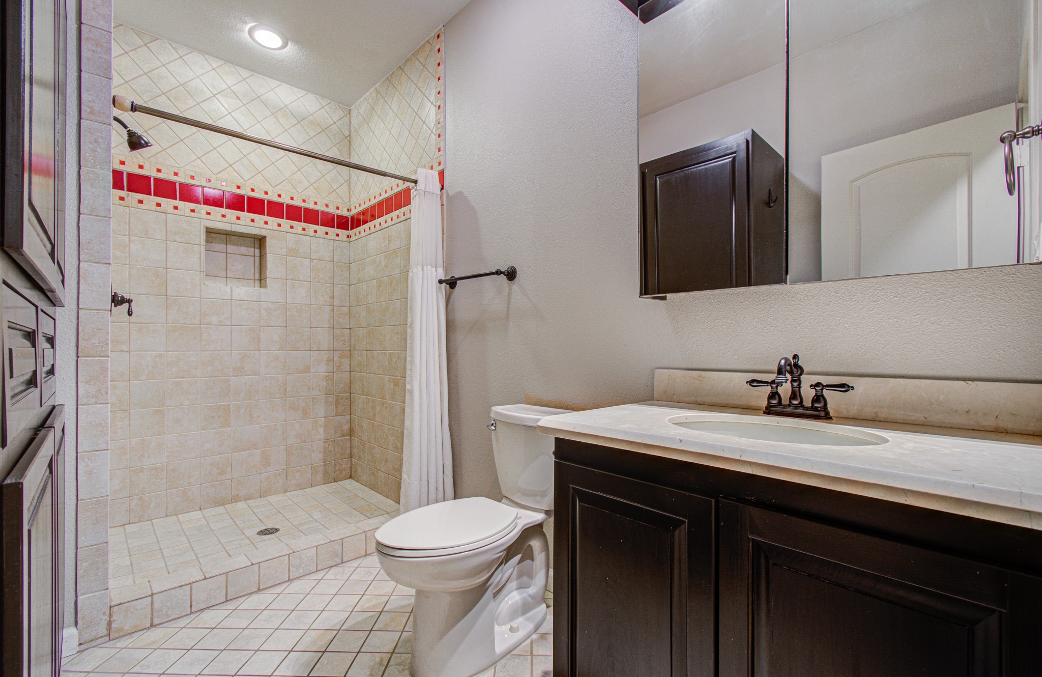 2920 Payson Street Houston, TX 77021 - Photo 37 of 50 a bathroom with a sink a toilet and shower