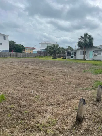 a view of a lake with a big yard