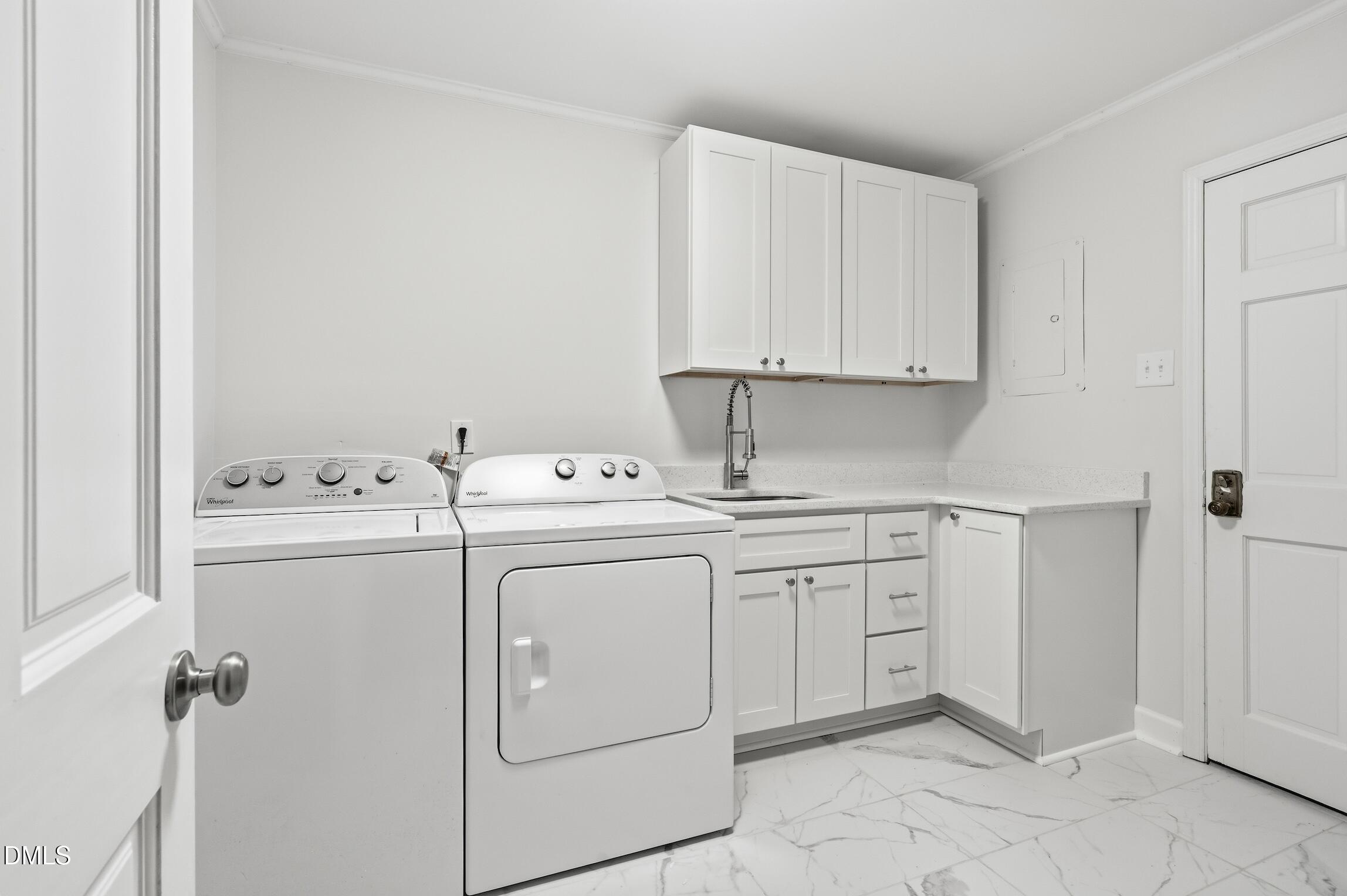 1504 Homestead Road Chapel Hill, NC 27516 - Photo 27 of 39 a utility room with dryer and washer