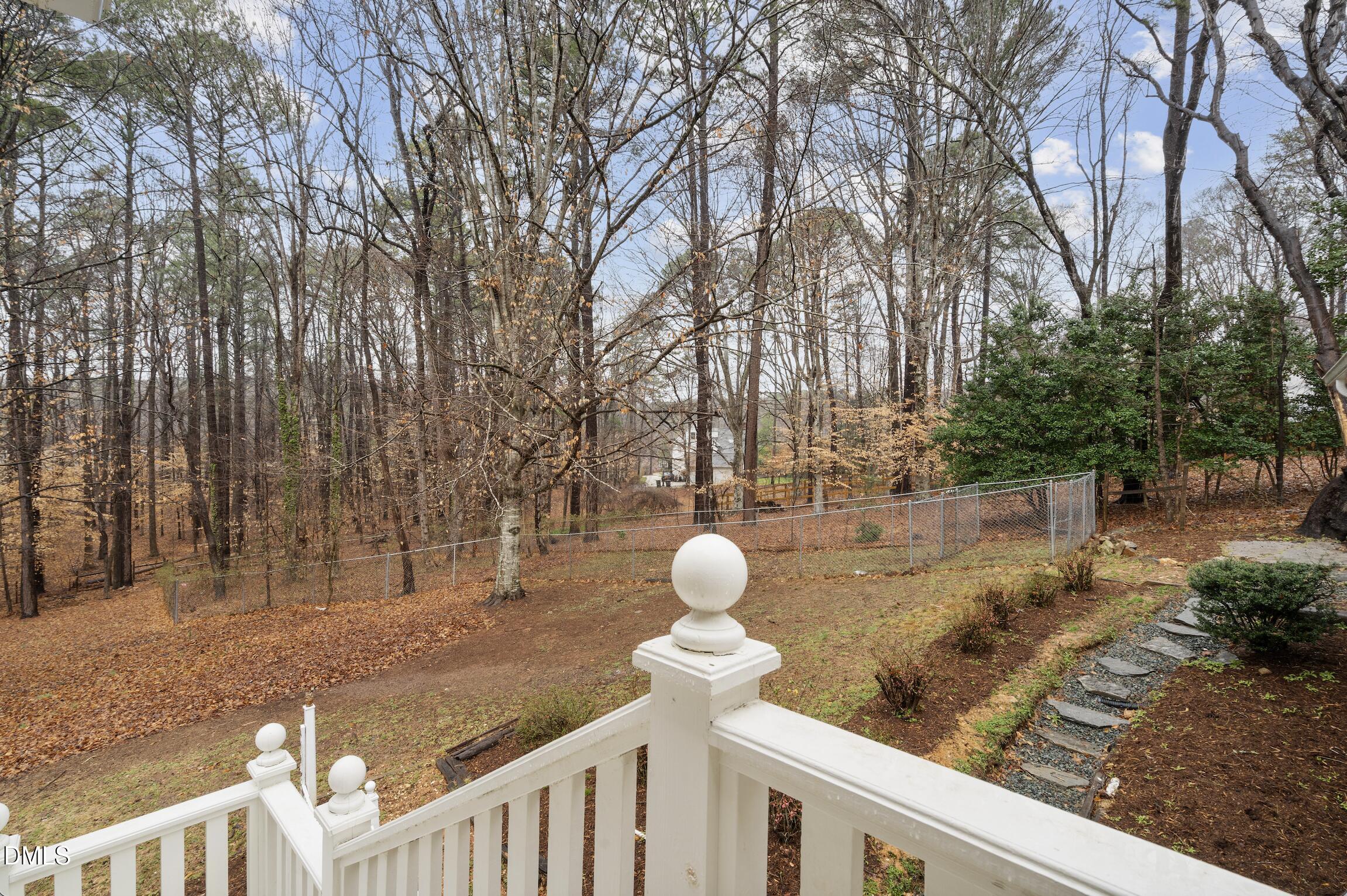 1504 Homestead Road Chapel Hill, NC 27516 - Photo 29 of 39 a view of yard with deck