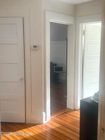 a view of a bedroom from the hallway