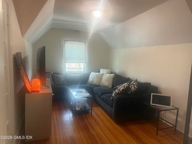 a picture of a room with wooden floor