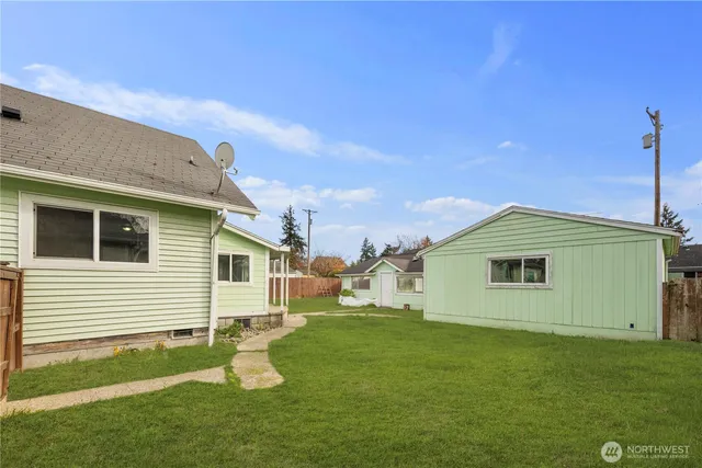 a bathroom with a sink and a yard