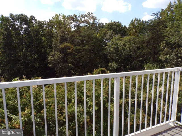a view of a wooden fence