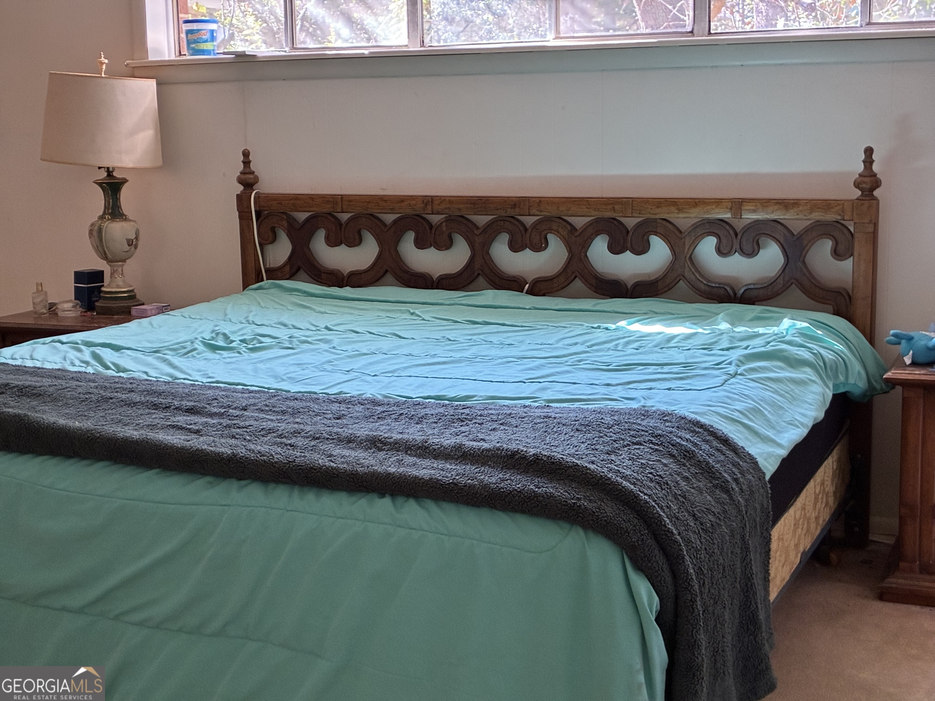 602 North Street Fort Valley, GA 31030 - Photo 22 of 40 a bed with a wooden floor