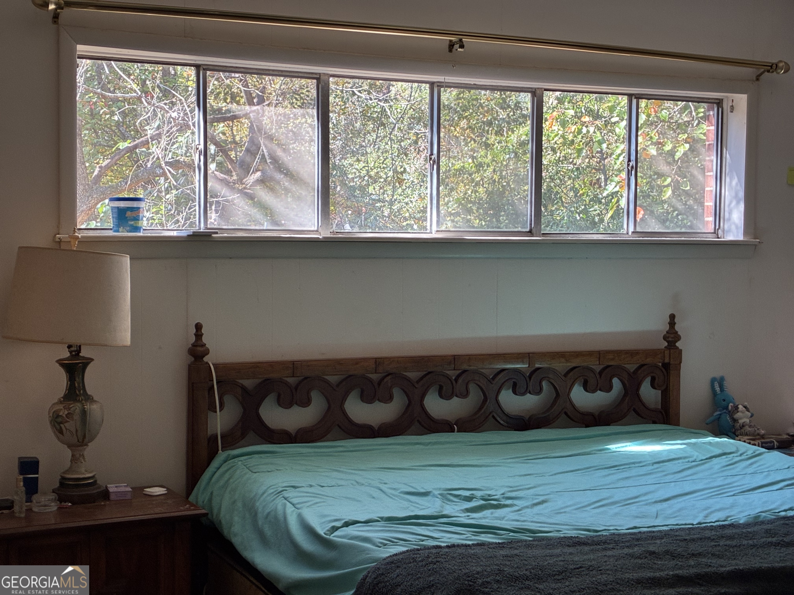 602 North Street Fort Valley, GA 31030 - Photo 23 of 40 a bed sitting in a bedroom next to a window