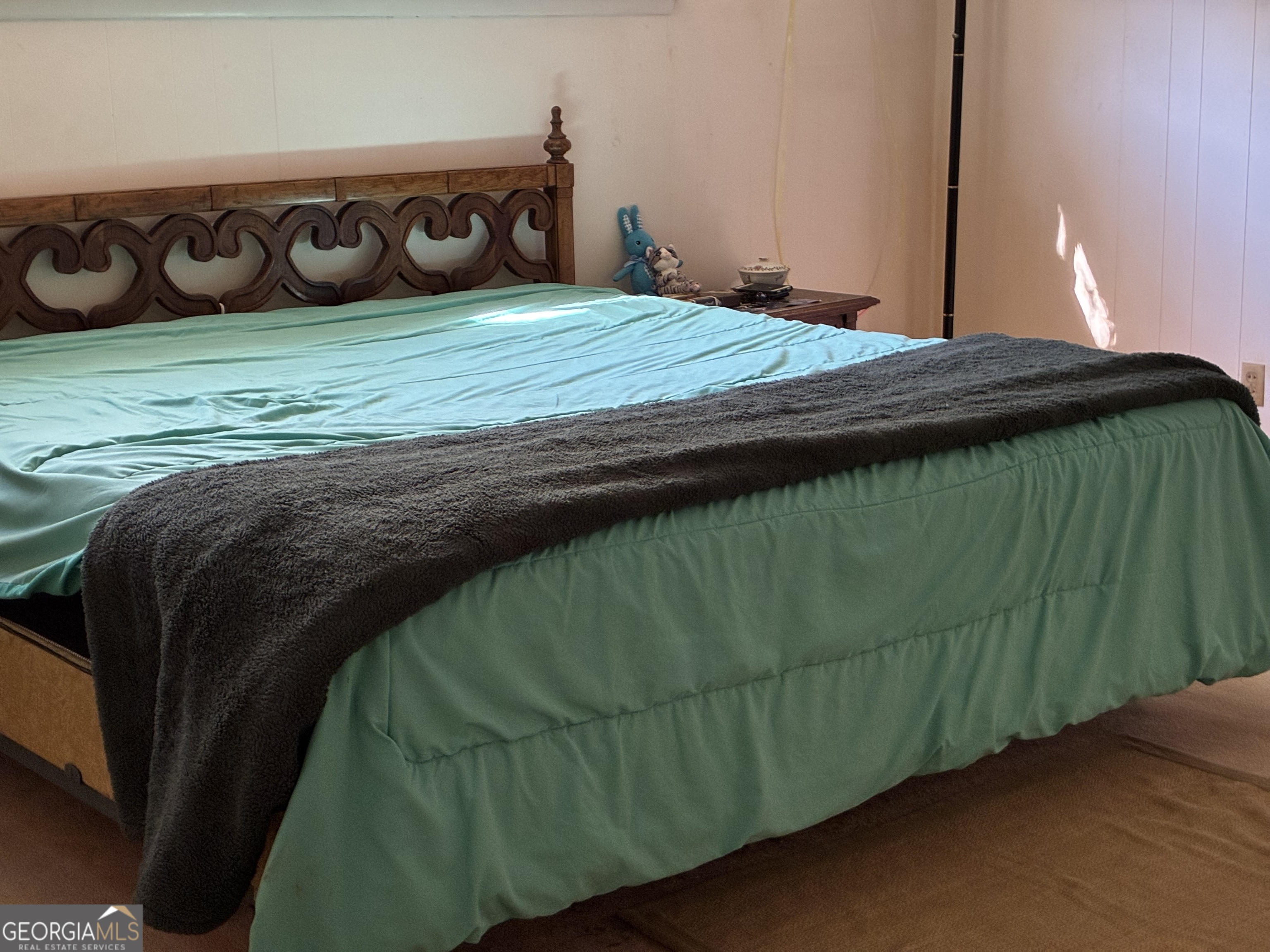 602 North Street Fort Valley, GA 31030 - Photo 24 of 40 a bedroom with a bed and a window