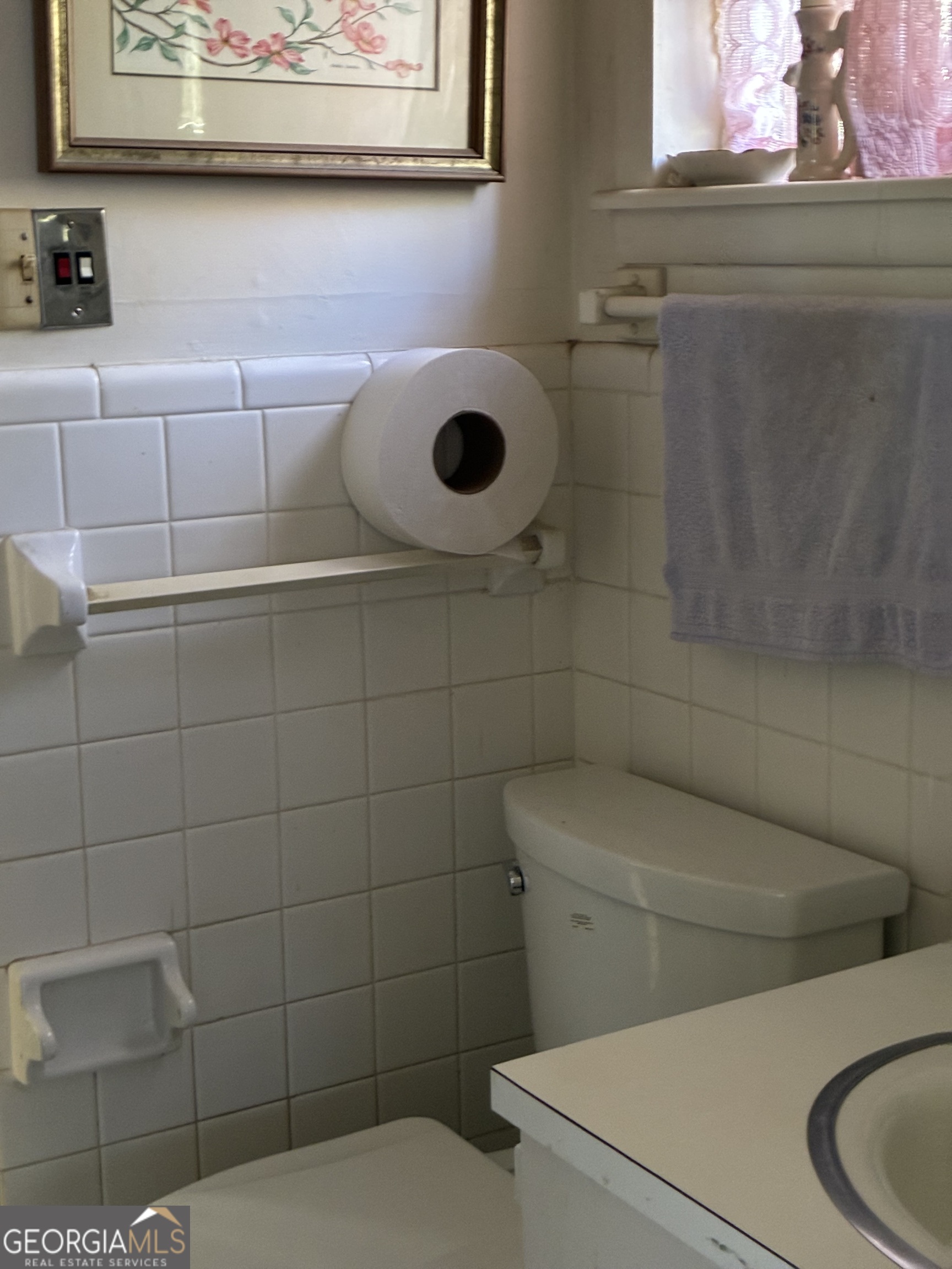 602 North Street Fort Valley, GA 31030 - Photo 29 of 40 a bathroom with a toilet and a sink