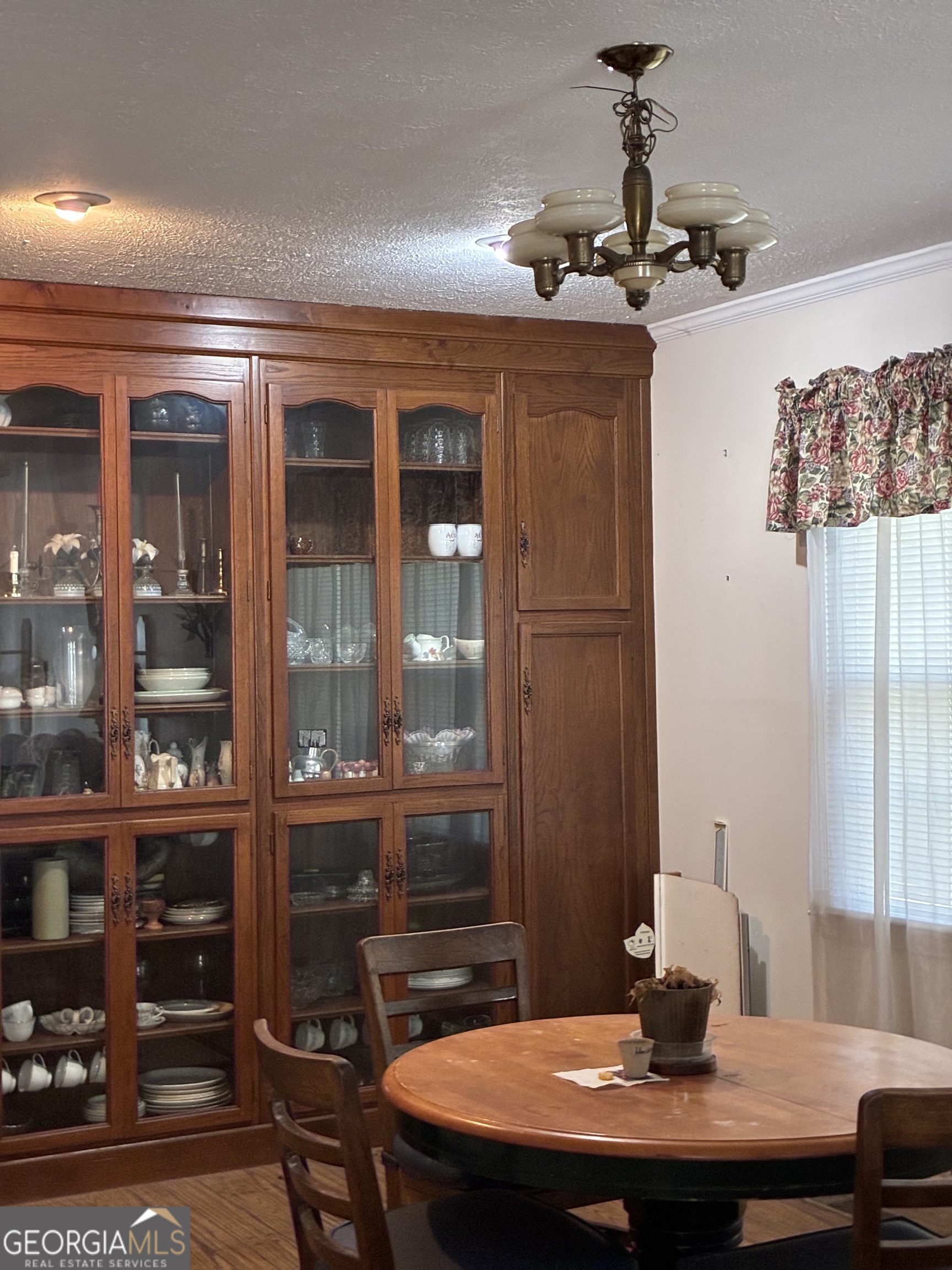 602 North Street Fort Valley, GA 31030 - Photo 9 of 40 a dining room with a table and chairs