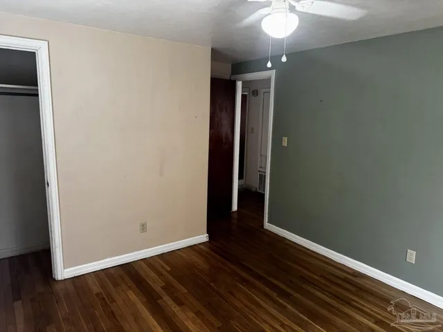 a backyard of a house with lots of green space