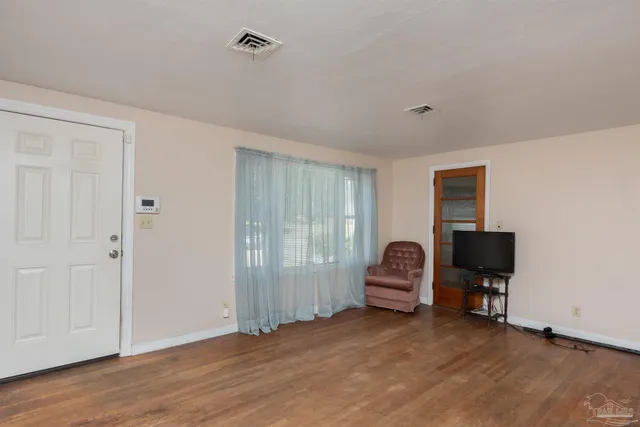 a view of room with window lounge chair and windows