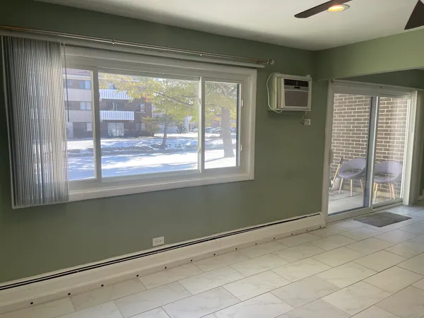 a view of a room that has a window in it