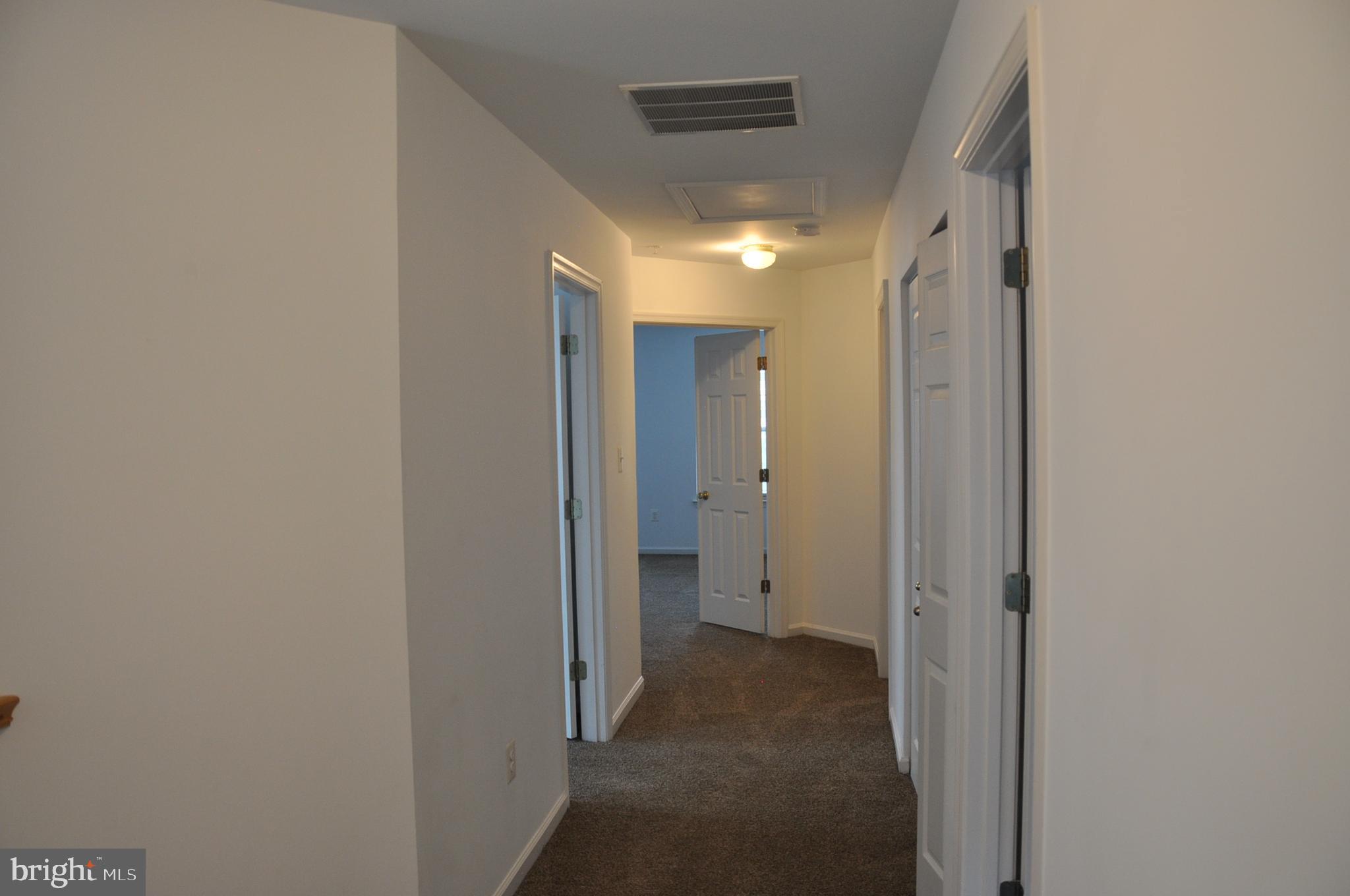201 Canvasback Way Cambridge, MD 21613 - Photo 8 of 14 2nd Floor hallway