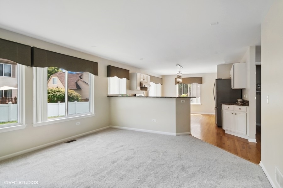 3090 Whitney Road Aurora, IL 60502 - Photo 11 of 24 a view of kitchen with refrigerator and window