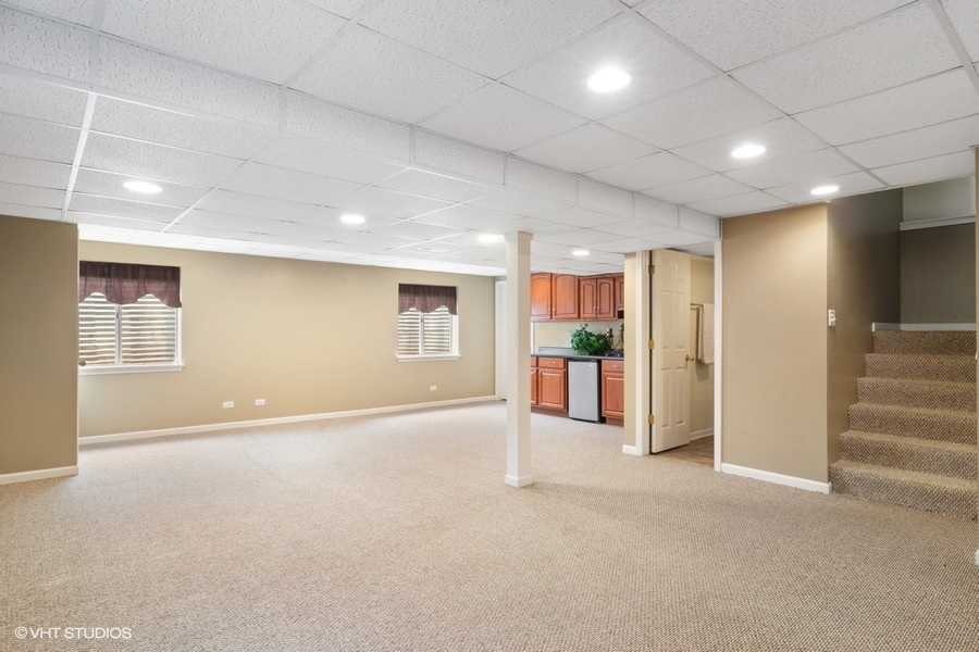 3090 Whitney Road Aurora, IL 60502 - Photo 20 of 24 a view of an empty room with wooden floor