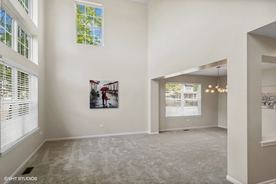 3090 Whitney Road Aurora, IL 60502 - Photo 3 of 24 an empty room with windows