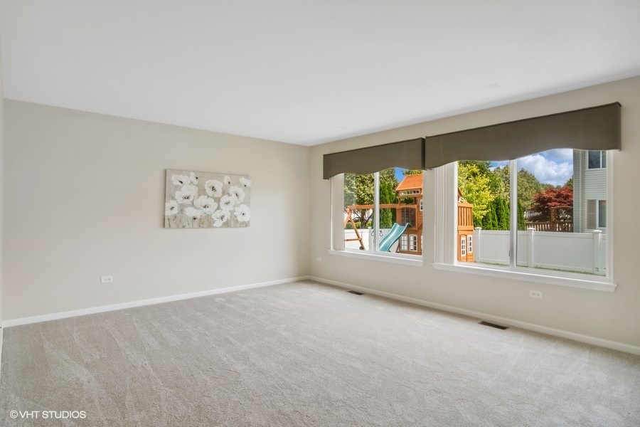 3090 Whitney Road Aurora, IL 60502 - Photo 10 of 24 an empty room with windows